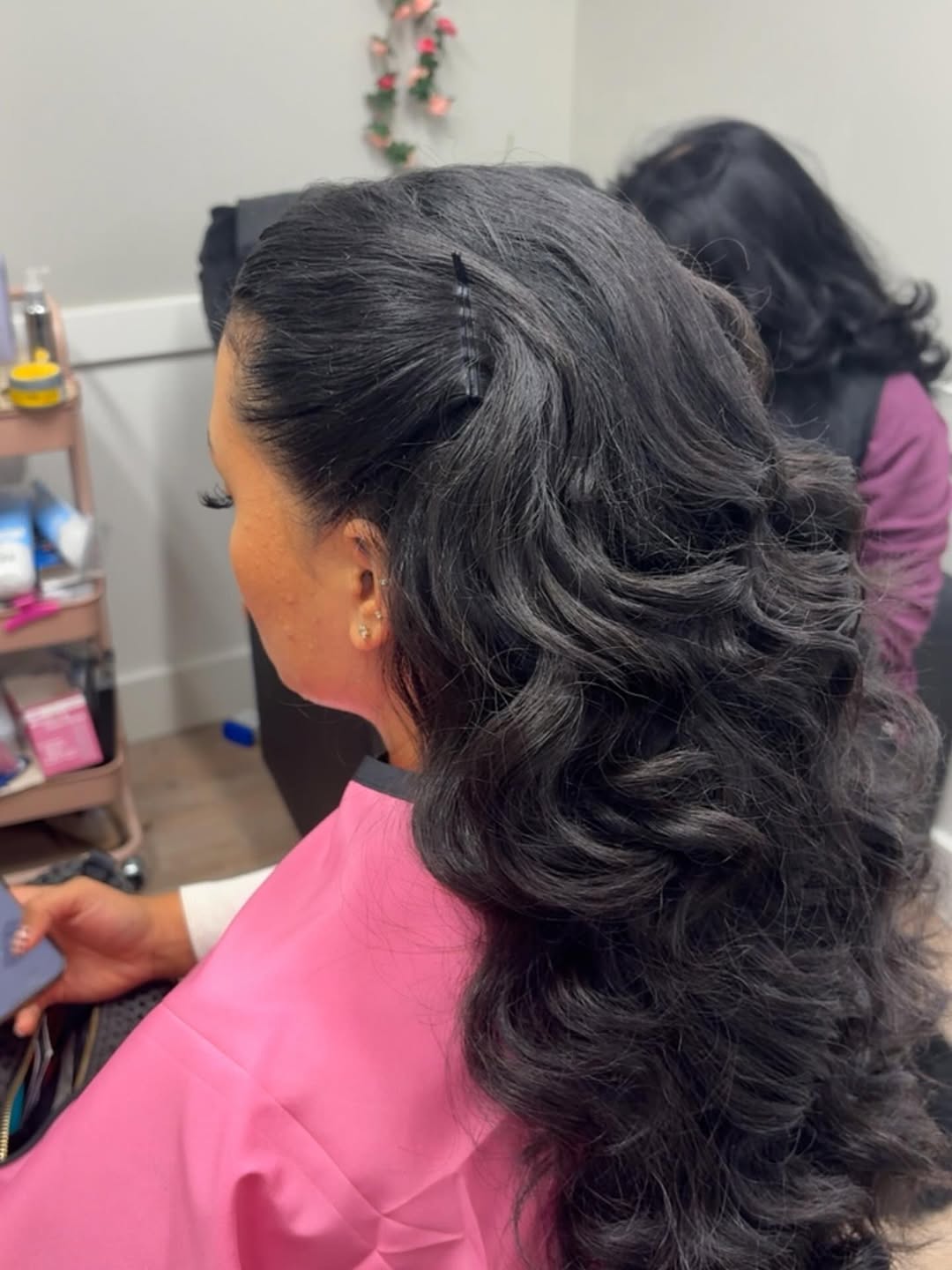 Long polished curl-out ponytail styled by MakeupByGen