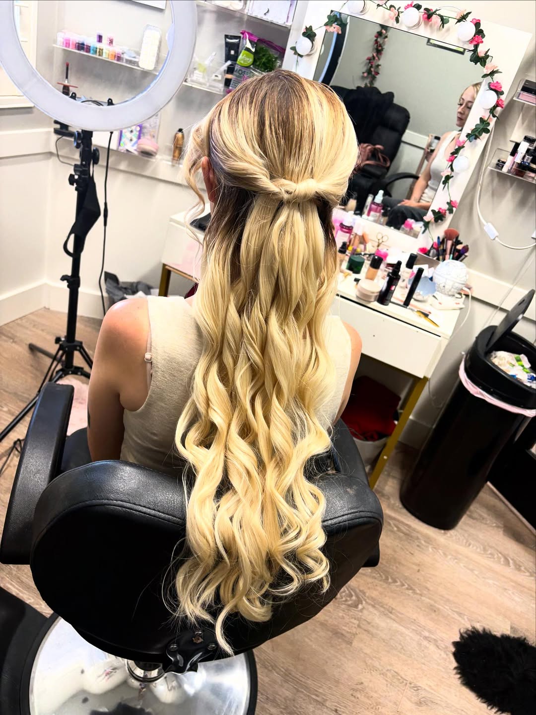 Long blonde half-up curls styled in the MakeupByGen Ogden studio