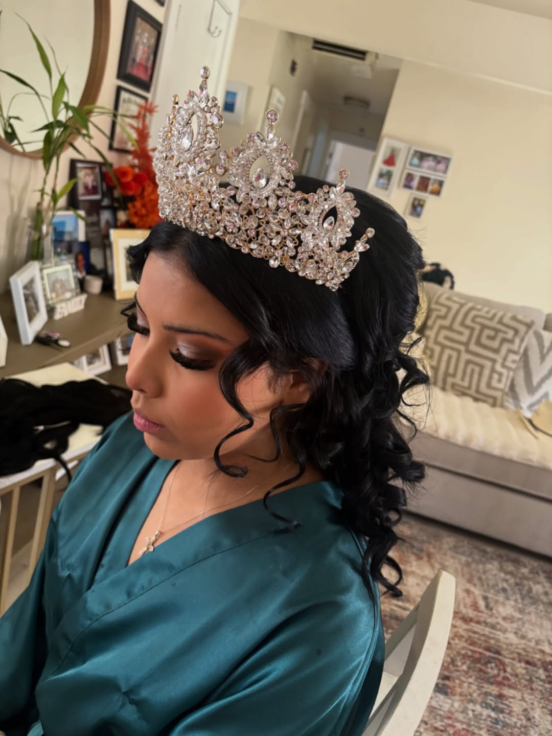 Quinceañera with crystal crown and soft curls by MakeupByGen